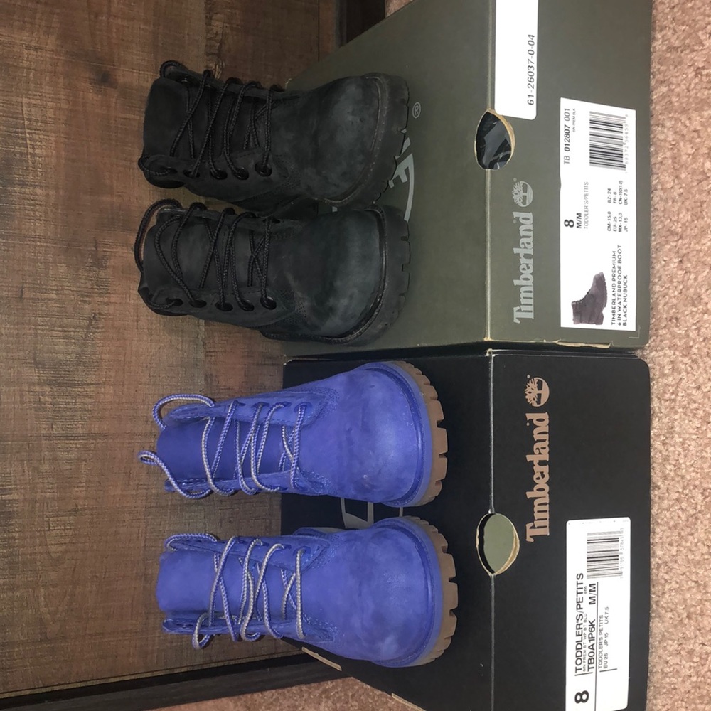 two pair of toddler timbs